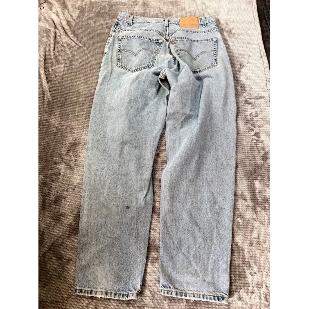 Vintage Levis 560 Loose Fit Tapered Leg Jeans Light Wash Denim USA Made 34x31